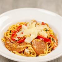Cajun Chicken · linguine, roasted chicken, andouille sausage, onion, roasted red peppers, cajun parmesan cre...