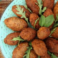 Kibbeh · Five pieces. Made of organic cracked wheat minced onions, lean ground beef, and topped off w...