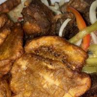 Fritay (Fritters) · With meat, marinade (fried dough), banane (fried plantations) comes with our choice of eithe...