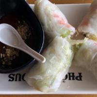 A1 Summer Rolls · Two rolls. steamed shrimps, lean pork, vermicelli, and vegetables rolled in rice paper. serv...