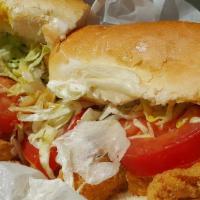 Fried Catfish Po Boy Sandwich · Spicy. Deep-fried catfish. Served with traditional toppings, fry sauce, and tiger sauce. Dre...