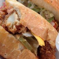 Fried Chicken Po Boy Sandwich · Spicy. Deep-fried chicken breast strips. Served with traditional toppings, fry sauce, and ke...