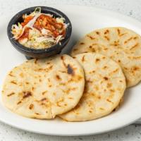 Pupusas Salvadorena · Homemade “pupusas” Salvadoran style stuffed with choice of bean, cheese, pork or loroco. Ser...
