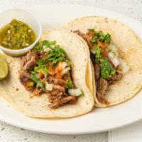 Taco Salvadoran · Thin or handmade corn tortilla your choice beef, chicken, lengua (cow tongue) or chicharron ...