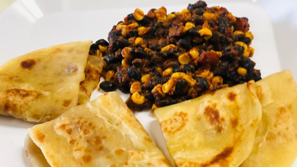 Chapati Meal  · Freshly homemade East-African flat bread served with a side of beans and beef stew.