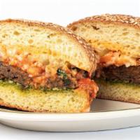 Hot Vegan Meatball  · Vegan meatballs, vegan mozzarella, spicy garlic-tomato sauce, basil-almond pesto, giardinier...
