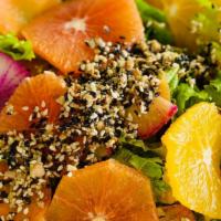 Market Greens Salad · Lunch sized mixed greens, oranges, pickled carrots,
radishes, spiced almonds and sesame seed...