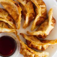 Pot Stickers  · Chicken and vegetable pot stickers served with sweet soybean sauce.