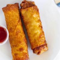 Egg Rolls · Shredded vegetables wrapped in rice paper, lightly fried, and served with sweet and sour sau...