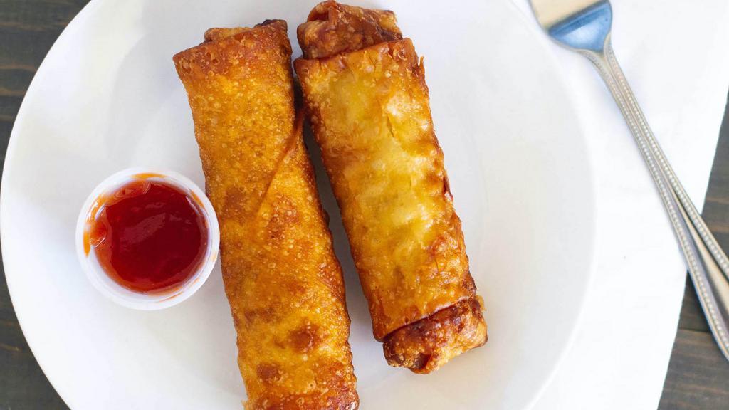 Egg Rolls · Shredded vegetables wrapped in rice paper, lightly fried, and served with sweet and sour sauce.