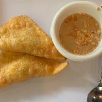 Fried Wontons  · Cream cheese wrapped in wonton skin, lightly fried and served with sweet and sour sauce.