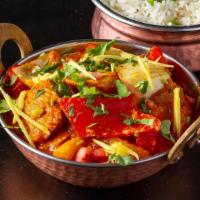 Kadai Chicken · chicken breast sauteed in onion,tomato,bell pepper and indian herbs
