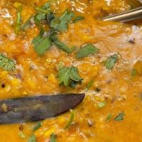 Dal Tadka · Yellow lentils cooked with onion,tomatoes,ginger,garlic with cumin seeds