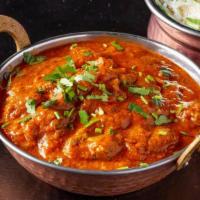 Lamb Curry · lamb cubes cooked traditional indian styled curry sauce