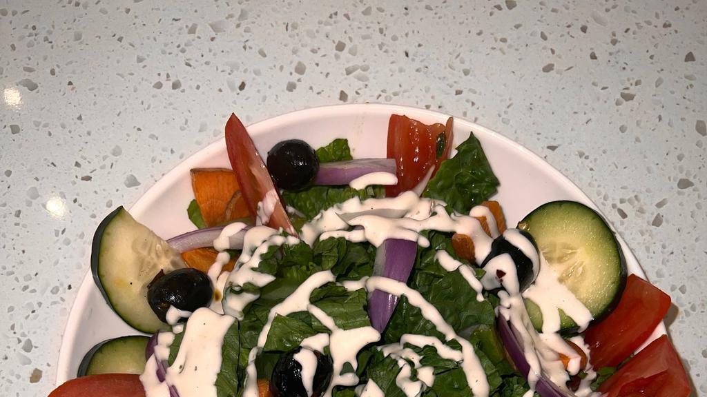 House Salad · Romaine lettuce, grape tomatoes, black olives, cucumber, carrots, ranch dressing.