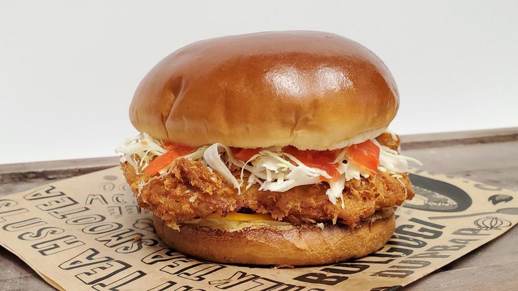 Pk Chicken Sandwich · Crispy and juicy panko breaded chicken breast, topped with savory house made coleslaw and Asian pickle  on brioche bun.