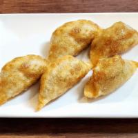 Mandu  (Fried Dumpling) · Fried dumpling choice of vegetable, chicken, or beef. 5 pcs