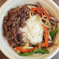 Vegan Bulgogi Dupbop · Double portion of spicy and sweet marinated soy based meat substitute in sauce with stir fry...