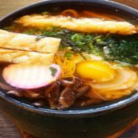 Seafood Udon · Kelp soy broth flour noodle w/ spinach, egg, fish cake, green onion, soft shell shrimp, scal...