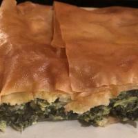 Spanakopita · Chopped spinach with feta cheese and spices all layered in filo dough.