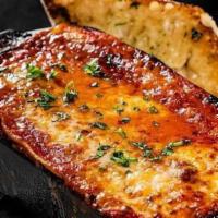 Bison Lasagna · House ground bison and Italian sausage layered with marinara and mozzarella cheese