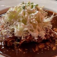 Mole Enchiladas · Served with three corn tortillas stuffed with chicken, fresh cheese, onions sour cream, rice...