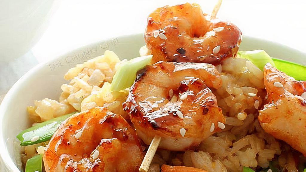 Shrimp · 2 grilled shrimp sticks, 2 egg rolls, over easy egg, white rice, and salad peanut dressing