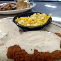 Chicken Fried Chicken Or Steak · Your choice of chicken or chopped steak breaded and deep-fried, then smothered in country gr...