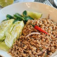 Larb Gai · Ground chicken or tofu with mint leaves, red onion, green onion, carrot, cilantro and chili ...