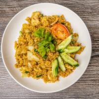 Pineapple Fried Rice · Fried rice  with egg, pineapple, tomato, onion, cashew nut .