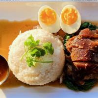 Kao Kha Moo · Stewed pork hock with Chinese five spice, Chinese broccoli, boiled egg over rice and spicy s...