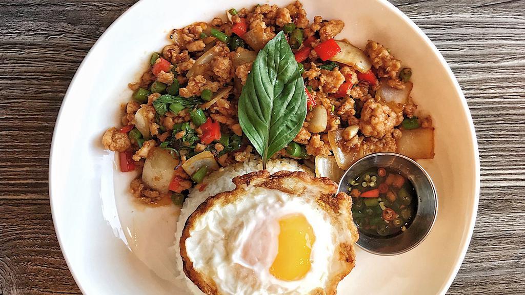 Krapow Kai Dao (Served With Steamed Rice) · Stir-fried spicy basil sauce , green beans, bell peppers and onion, basil ,fried egg, served with steam rice.(Medium Spicy)