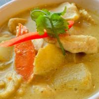 Yellow Curry · Thai yellow curry with white onion, carrot and potatoes .