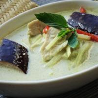 Green Curry · Thai green curry with bell pepper, bamboo shoot, 
eggplant and basil.