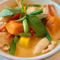 Pumpkin Curry · Pumpkin in Thai red curry, green bean, basil, bell peppers .