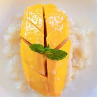 Mango Sticky Rice · Coconut milk ,sugar ,sticky rice with sweet mango.