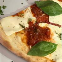 Margherita Pizza · Marinara sauce, fresh homemade mozzarella, fresh basil and our signature extra virgin olive ...