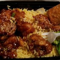 Sesame Chicken · Fine and flavor chunk chicken served with toasted sesame seeds topping. Spicy.