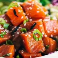Salmon Poke Bowl · Spicy. Salmon pokini, rice, cucumbers, avocados, carrots, jalapenos, edamame, scallions, pok...