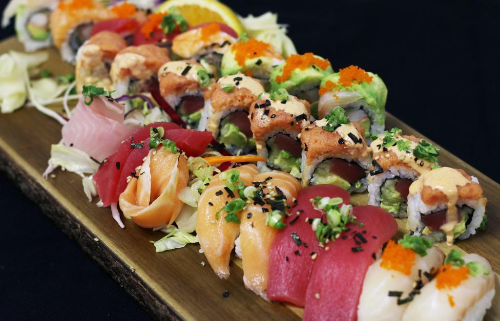E13 · 6 Pcs Sushi + 6 Pcs Sashimi + 2 Special Rolls<br />* Chef's Choice of Sushi & Sashimi<br />Served w/ 3 Miso Soups