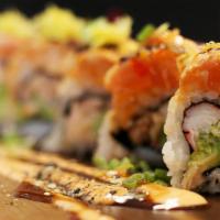 Sunshine Roll · Salmon Teriyaki, Crab, & Avocado Roll w/Seared Spicy Salmon, & Lemon Zest Topping