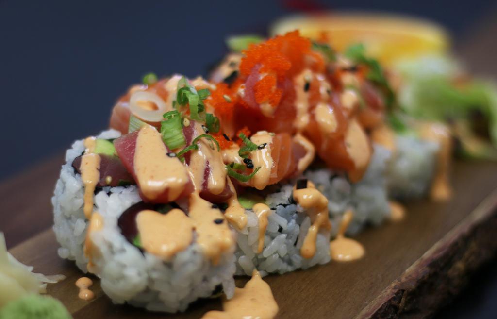 Sashimi Roll · Tuna, Crab, & Cucumber Roll w/ Chopped Sashimi Topping