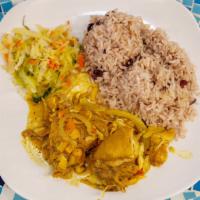 Curry Chicken · Jamaican spiced curry chicken cooked on the bone until tender. Served with rice and peas and...