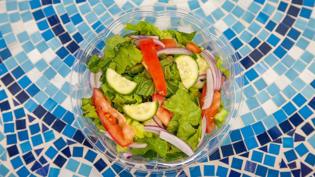House Salad · Romaine lettuce, cucumbers, tomatoes and sliced red onion
