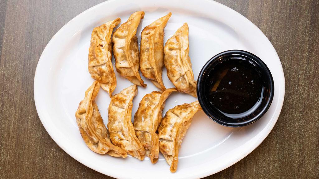 Pork Dumplings (8) · Pan fried pork and vegetable dumplings, served with sweet and sour chili sauce.