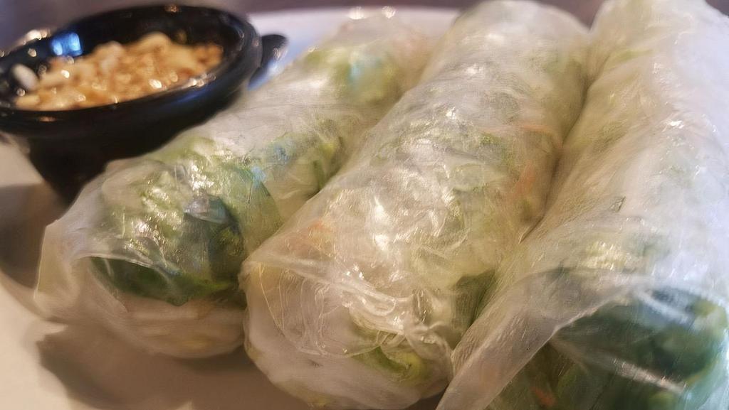 Spring Rolls (4) · Gluten free, vegetarian. Made fresh to order with only the finest rice paper, rice noodles, and  vegetables. Your choice of pork and mixed veggies or vegetarian. Served with your choice of our Thai sweet and sour sauce with peanuts on top.