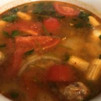 Tom Yum Gai Soup · Gluten free, spicy. A Thai original, a spicy and sour soup with chicken, mushrooms, baby cor...