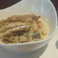 Chicken Alfredo · Grilled chicken breast, garlic-Parmesan Alfredo sauce, cavatappi pasta, served with red wine...