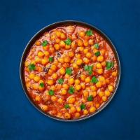 Chickpea Supreme · Chickpeas, slow-cooked till soft in an onion and tomato curry with Indian whole spices.
