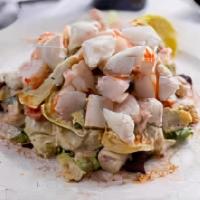 Kirby'S Seafood Salad · Shrimp, Lump Crab, Artichoke Hearts, Hearts of Palm, Onions and Tomato tossed in or Homemade...